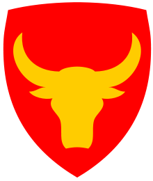 The head of the water buffalo symbolizes the Philippines. The colors red and gold represent the islands' Spanish colonial roots.