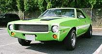 Shows front view of a neon green 1969 "Mod" Javelin customized with a grille from an AMX