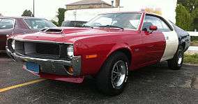 Shows a 1970 Javelin Trans-Am finished in the factory red/white/blue paint scheme