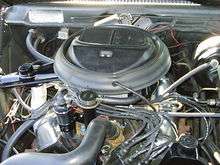 Shows the engine compartment of a 1973 Javelin with a 401 "Go Pac"