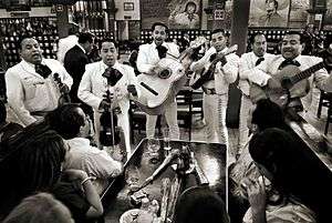 Mariachis playing at the Tenampa in Mexico City