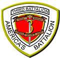 A white shield with a red interior and a gold border. On the top is written "Third Battalion" and on the bottom written "America's Battalion". The red interior has a "3" in the center with a sword running through it with the words "Third Marines" on the top and "Fortes Fortuna Juvat" on the bottom.
