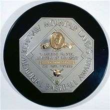 A silver plaque with gold decoration mounted on a black backing. Its inscription includes "Kenesaw Mountain Landis Memorial Baseball Award", "Most Valuable Player – American League", and the player's name and team.