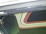Shows the headliner inside the car that also featured the fashion designer's stripes