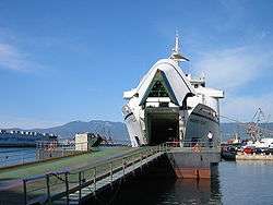 Docked ferry with bow gate open