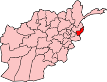 Pink map of Afghanistan, with Kunar Province in red in the northeast