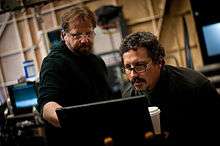Andrew Marlowe and Rob Bowman working on the set of Castle.