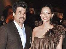 Sonam Kapoor and her father Anil Kapoor posing for the camera