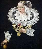  A seventeenth-century painting of a woman wearing a ruff, the decorative collar from which the English name of the bird derives. She is wearing a black dress with a particularly large and elaborate white lacy ruff, and holds a flower in her left hand.