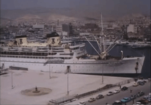 SS Athanai and other vessels in the port of Piraeus, Greece