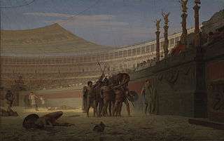 Somewhat stylized view from within a Roman arena; a group of around seven gladiators are picked out by the sunlight saluting the Emperor, their weapons and shields held aloft. The stalls for the immense audience stretch into the distance. On the ground a small number of the dead from previous combats lie where they fell in the sand.