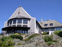 The southeast view of Government House from below, showing the bow window of the Ballroom at left