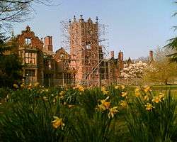 Daffodils on the Tower Lawn at Bank Hall with a view of the south elevation of the hall