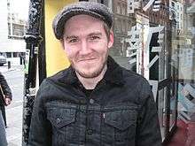 A shot of Brian Fallon, looking into a nearby camera.