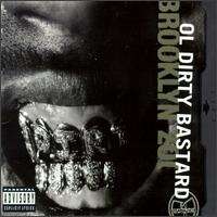 The cover is shown in black-and-white with the artist's name and title cover shown sideways on the right side and an image of ODB's golden grillz is shown in the center.