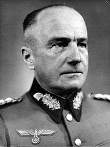 black and white head and shoulders portrait of male in German uniform with no cap
