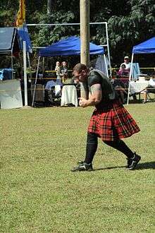 Tossing of the caber at the Scotland County Highland Games