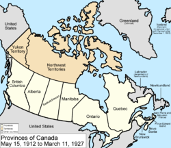 Map of the country of Canada on May 15, 1912, depicting the newly expanded provinces of Manitoba, Ontario, and Quebec along with Prince Edward Island, New Brunswick, British Columbia, Alberta, Saskatchewan and Nova Scotia, in the colour white. The Northwest Territories and the Yukon Territory are depicted in the colour pink. The area called Newfoundland, Labrador, and Alaska are depicted in bluish grey colour, and are not a part of Canada.