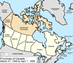 Map of the country of Canada on March 31, 1949, showing the new province Newfoundland and Labrador along with Manitoba, Ontario, Prince Edward Island, Quebec, New Brunswick, British Columbia, Alberta, Saskatchewan and Nova Scotia, in the colour white. Ontario expands west to the Lake of the Woods and north to the Albany River. Provinces are coloured white. The Northwest Territories and the Yukon Territory are depicted in the colour pink. The area called Alaska is depicted in bluish grey colour, and is not a part of Canada.