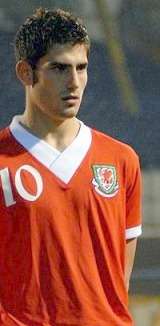 Ched Evans in his Wales shirt prior to a fixture