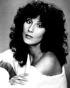 Black-and-white publicity photo of Cher circa the 1970s.
