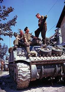 Crew of a Sherman-tank resting while parked