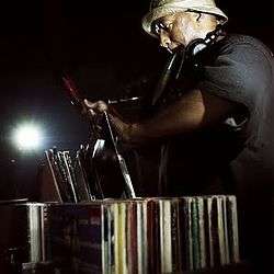American producer "DJ Premier" Looking through his vinyl record collection for potential samples