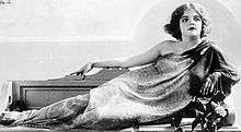 Glamorous publicity photograph of Dagmar Dahlgren reclining