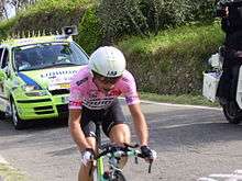 A man riding in a time trial
