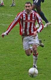 Danny Higginbotham playing for Stoke City