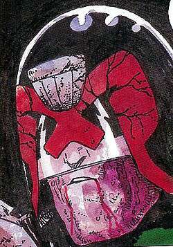 A head shot of a man who looks like Judge Dredd, but his helmet is damaged, with large cracks all over it. He is bleeding from the mouth.