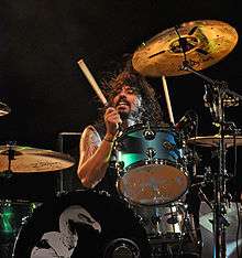 Dave Grohl playing drums.