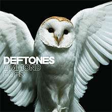 A barn owl is shown with its wings open in front of a black background. On the complete left-side of the boarder, the words "Deftones" and "Diamond Eyes" are shown.