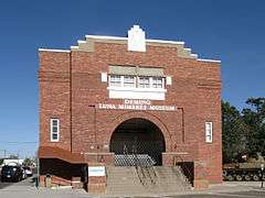 The red-brick front facade of the Deming Armory