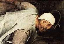 Detail of a painting. A man with no eyes and a white hat stumbles.