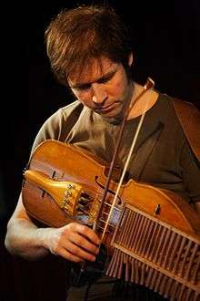 Didier François playing the Nyckelharpa
