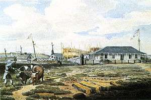 Naval shipyard, Point Frederick, July 1815. Watercolour by Emeric Essex Vidal. Commodore's house and two ships under construction, the Canada and the Wolfe, can be seen in the background