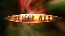 A geometrical symmetric lens shape with the words Doctor Who in all-caps flying trough green and red wormhole effect.