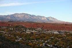 St. George with the Red Cliffs and Pine Valley Mountains in the background