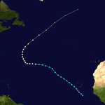 The track of a hurricane starts in the far eastern waters of the Atlantic, and spans much of the ocean before curving northward.