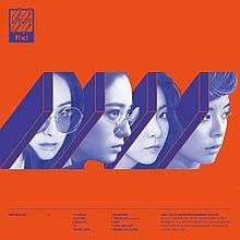 The album cover artwork includes four blue walls against an orange background, with the four members' faces in between the walls.