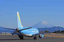 Fuji Dream Airlines Embraer 170 in light blue livery at Shizuoka Airport