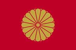 A golden flower centered on a red background