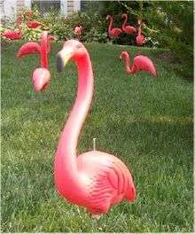 Photograph of plastic flamingo.