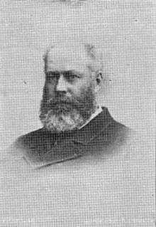 portrait photo of Francis James Garrick, showing him with a full beard and a balding head