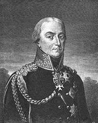 Black and white print depicts a stern-looking man in a dark military coat with a high collar and Iron Cross at his neck.