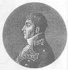 Black and white print of a young man with sideburns in dark late 18th century military uniform. He faces to the viewer's left.