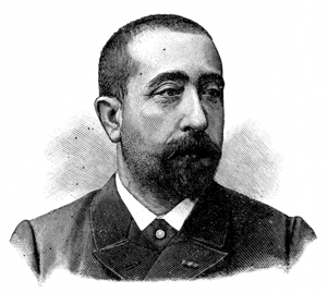 Head and shoulders of a man with a shorter Edwardian beard and closely cropped hair, in a circa-1900 French coat and collar