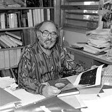 Picture of Gerson Goldhaber at his desk at Lawrence Berkeley Laboratory