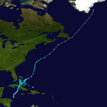 The path of a tropical cyclone starts in the southern Caribbean Sea and heads northward. After losing its tropical status, the storm's remnants dissipate near Greenland.